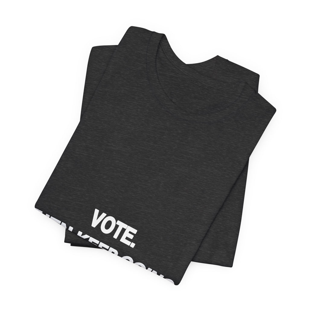Vote. Then Keep Going. printed in bold white type on a black unisex tee
