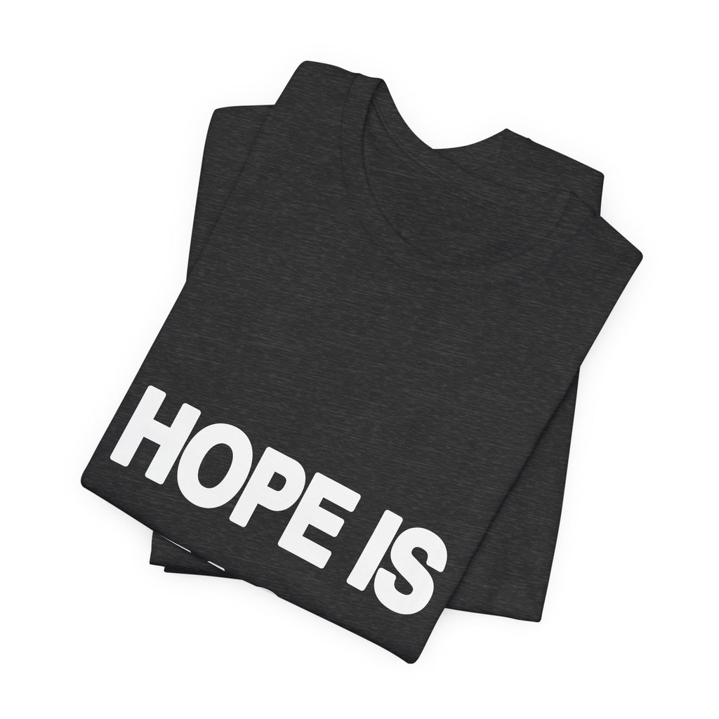 Hope Is a Tactic printed in bold white type on a black unisex tee