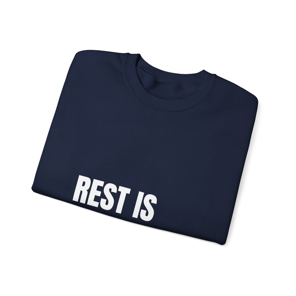 Rest Is Not a Reward — crewneck sweatshirt with white block lettering, printed to order in the USA