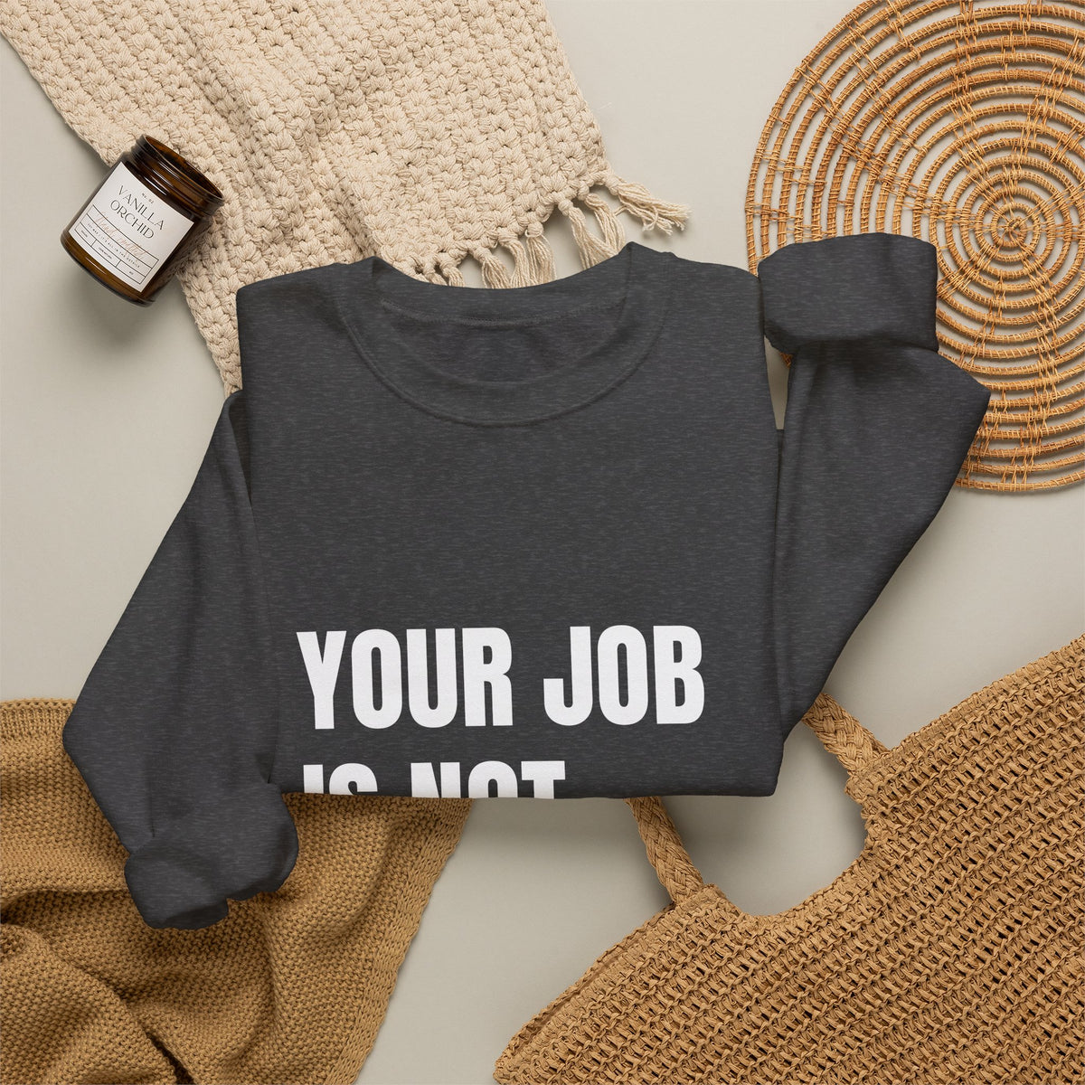 Crewneck sweatshirt reading “Your Job Is Not Your Life” in white block lettering