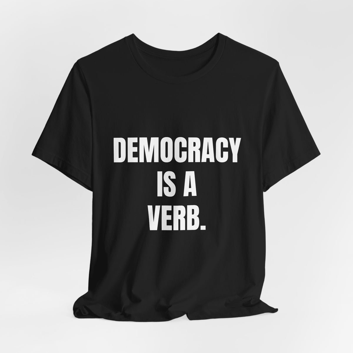 Democracy Is a Verb t-shirt in black, navy and dark grey heather, white block lettering
